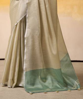 Women's beige tissue silk blend solid saree with unstitched silk blend blouse piece 3