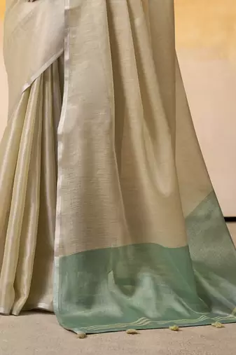 Women's beige tissue silk blend solid saree with unstitched silk blend blouse piece