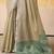 Women's beige tissue silk solid  saree with unstitched silk blouse piece