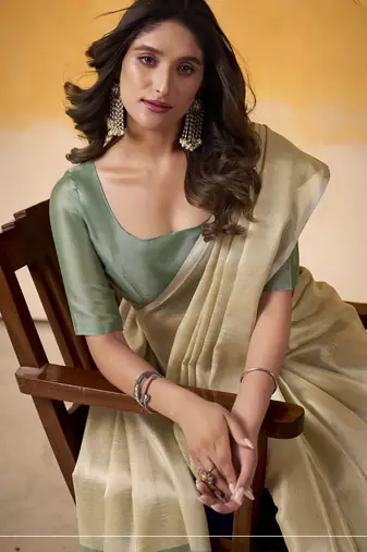 Women's beige tissue silk blend solid saree with unstitched silk blend blouse piece