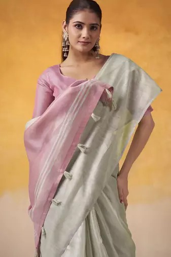 Women's mint tissue silk blend solid saree with unstitched silk blend blouse piece