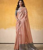 Women's peach tissue silk solid  saree with unstitched silk blouse piece