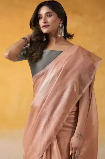 Women's peach tissue silk blend solid saree with unstitched silk blend blouse piece