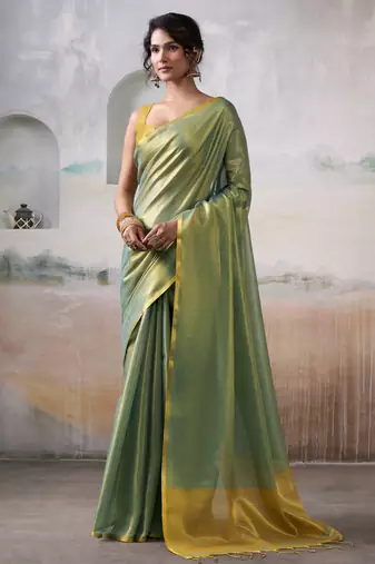 Women's green tissue silk solid  saree with unstitched silk blouse piece