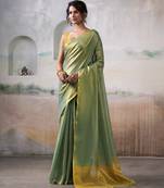 Women's green tissue silk solid  saree with unstitched silk blouse piece