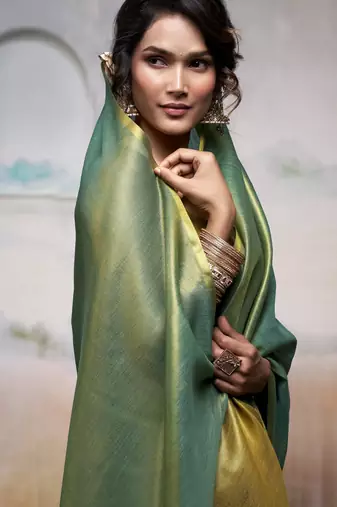 Women's green tissue silk blend solid saree with unstitched silk blend blouse piece