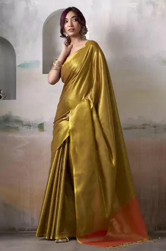 Women's gold tissue silk solid  saree with unstitched silk blouse piece