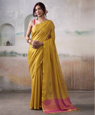 Women's yellow tissue silk blend solid saree with unstitched silk blend blouse piece 1
