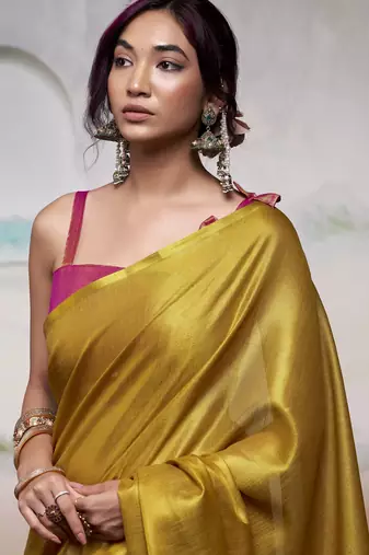 Women's yellow tissue silk blend solid saree with unstitched silk blend blouse piece