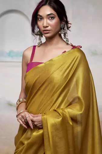 Women's yellow tissue silk blend solid saree with unstitched silk blend blouse piece