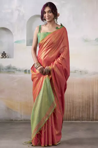 Women's peach tissue silk blend solid saree with unstitched silk blend blouse piece