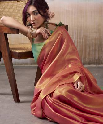 Women's peach tissue silk blend solid saree with unstitched silk blend blouse piece 3