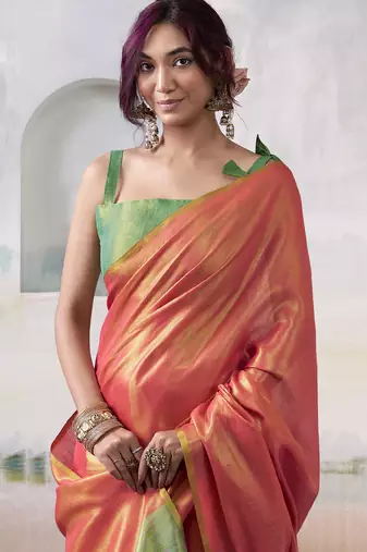 Women's peach tissue silk blend solid saree with unstitched silk blend blouse piece