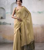 Women's beige tissue silk solid  saree with unstitched silk blouse piece