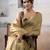Women's beige tissue silk solid  saree with unstitched silk blouse piece