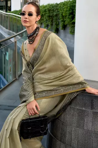 Women's khaki silk blend woven saree with unstitched silk blend blouse piece