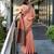 Women's peach silk blend woven  saree with unstitched silk blouse piece