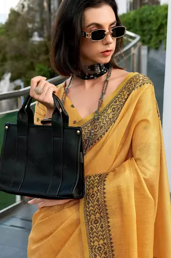 Women's mustard silk blend woven saree with unstitched silk blend blouse piece