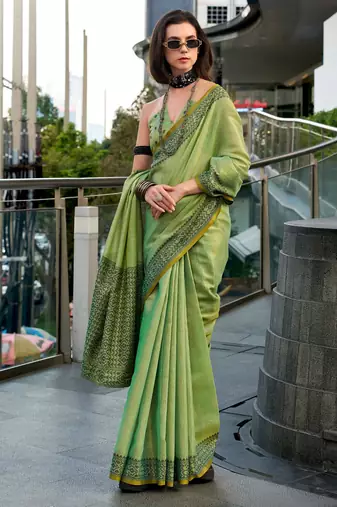Women's green silk blend woven  saree with unstitched silk blouse piece