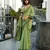 Women's green silk blend woven  saree with unstitched silk blend blouse piece