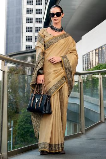 Women's beige silk blend woven  saree with unstitched silk blouse piece