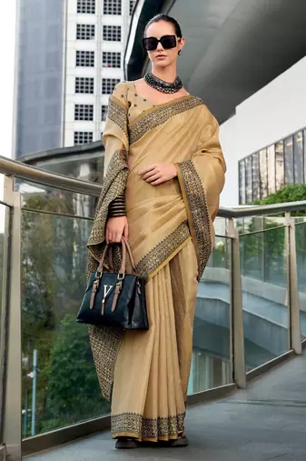 Women's beige silk blend woven  saree with unstitched silk blouse piece