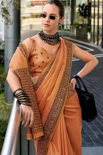Women's orange silk blend woven saree with unstitched silk blend blouse piece