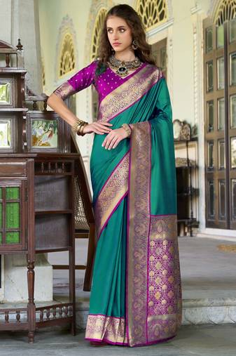 Women's dark green soft silk zari woven  saree with unstitched silk blouse piece
