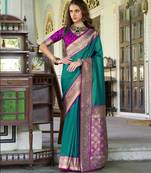Women's dark green soft silk zari woven  saree with unstitched silk blouse piece