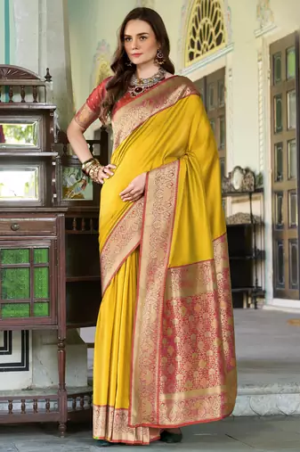 Women's yellow soft silk zari woven  saree with unstitched silk blouse piece