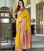 Women's yellow soft silk zari woven  saree with unstitched silk blouse piece