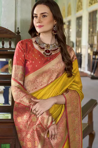 Women's yellow soft silk blend zari woven saree with unstitched silk blend blouse piece