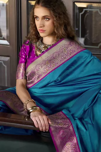 Women's teal soft silk blend zari woven saree with unstitched silk blend blouse piece