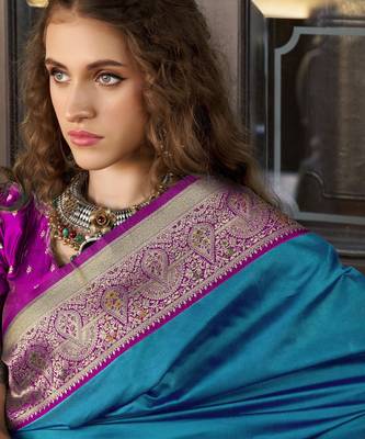 Women's teal soft silk blend zari woven saree with unstitched silk blend blouse piece 4