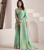 Women's sea green soft linen jacquard saree with unstitched silk blouse piece