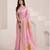 Women's pink soft linen jacquard saree with unstitched silk blouse piece
