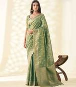 Women's green silk blend zari woven saree with unstitched silk blouse piece