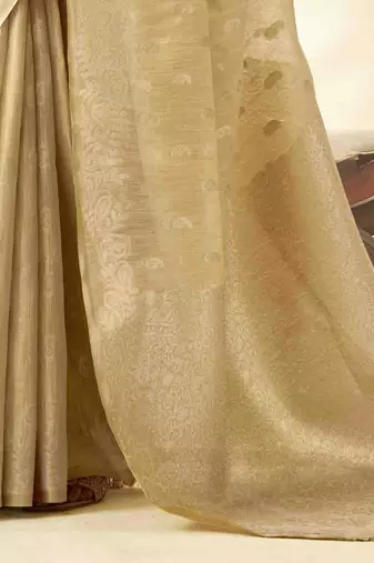 Women's beige silk blend zari woven saree with unstitched silk blend blouse piece