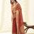 Women's rust silk blend zari woven saree with unstitched silk blouse piece