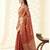 Women's rust silk blend zari woven saree with unstitched silk blouse piece