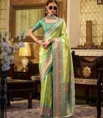 Women's green tissue silk zari woven saree with unstitched silk blouse piece