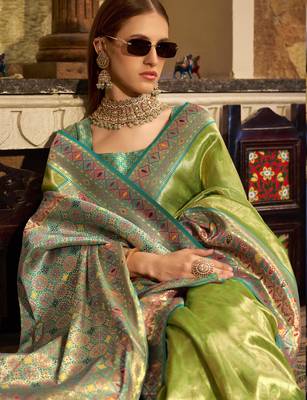Women's green tissue silk zari woven saree with unstitched silk blouse piece 3