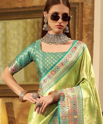 Women's green tissue silk zari woven saree with unstitched silk blouse piece 4