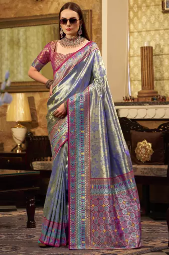 Women's blue tissue silk zari woven saree with unstitched silk blouse piece
