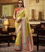 Women's yellow tissue silk zari woven saree with unstitched silk blouse piece