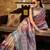 Women's pink tissue silk zari woven saree with unstitched silk blouse piece