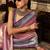 Women's pink tissue silk zari woven saree with unstitched silk blouse piece