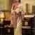 Women's beige tissue silk zari woven saree with unstitched silk blouse piece