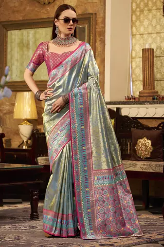 Women's turquoise tissue silk zari woven saree with unstitched silk blouse piece