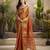 Women's rust tissue silk zari woven saree with unstitched silk blouse piece